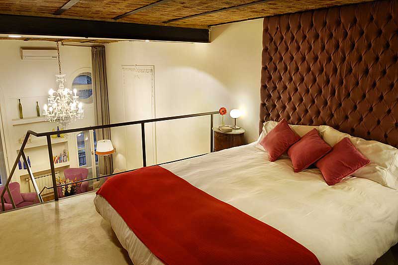 Luxury Rental Apartments Buenos Aires Bedroom Purple Headboard Brick Ceiling